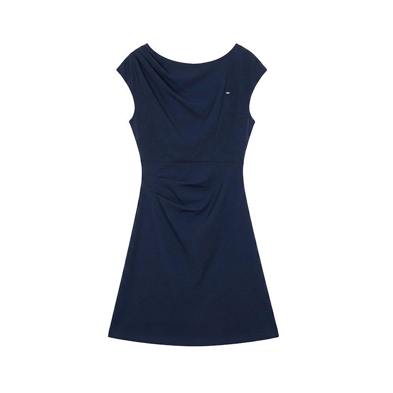 A-line cap sleeve ruched waist mini dress in soft stretch knit, front view on a standing model