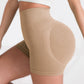 Sand ribbed shorts on a plain studio background, fine vertical rib visible all over