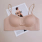 Nude skin tone seamless wireless push up bralette with fixed molded cups and thin straps