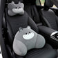 Gray cat headrest pillow on the seat headrest and gray cat lumbar pillow on a black car seat