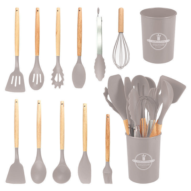 Khaki kitchen utensil set shown in rows next to the filled storage holder