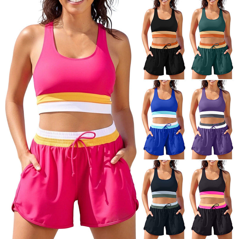 Womens color block two piece swim set with racerback tank top and drawstring shorts in seven colorways