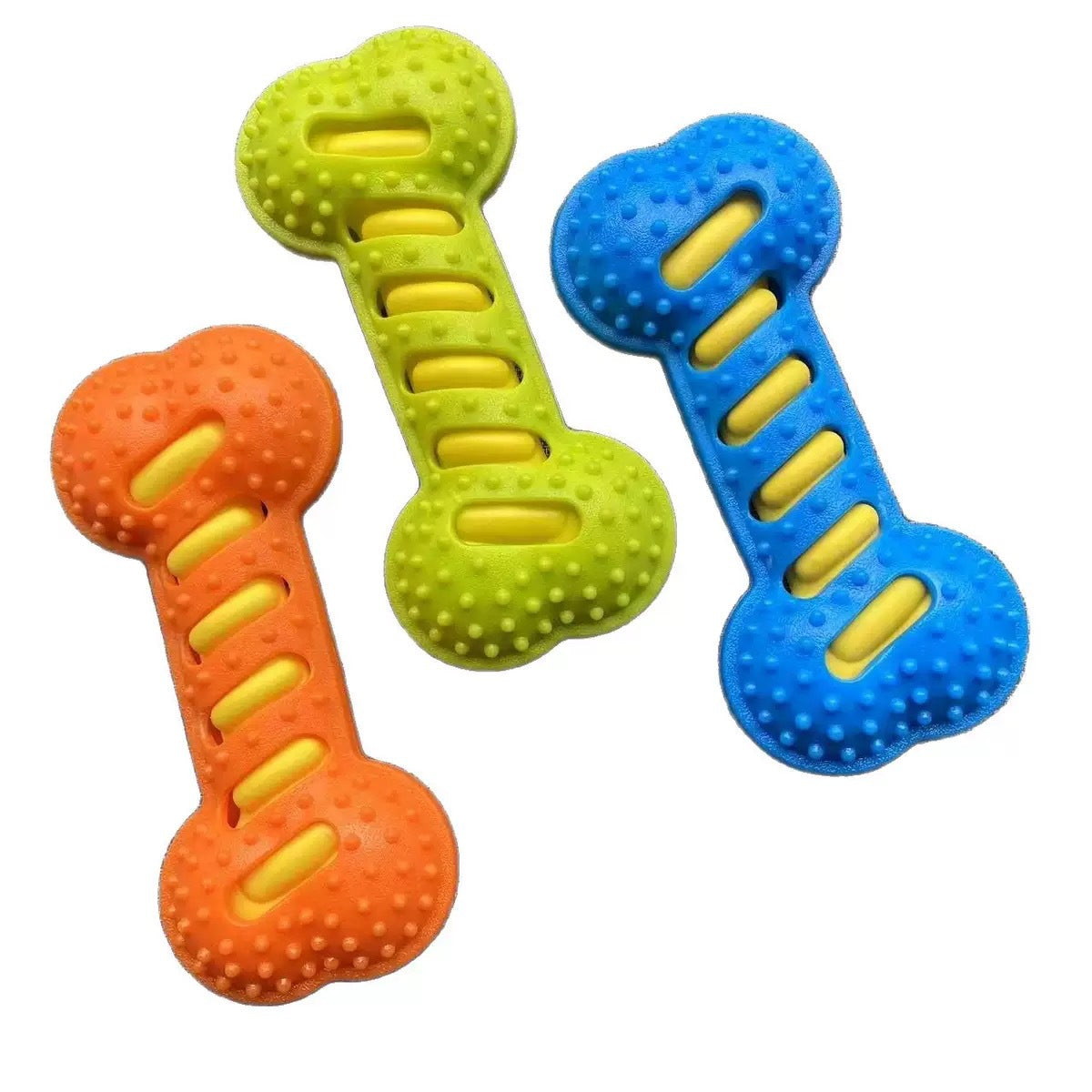 A yellow TPR tumbler toy for dogs and cats, part of a soft rubber pet toy assortment