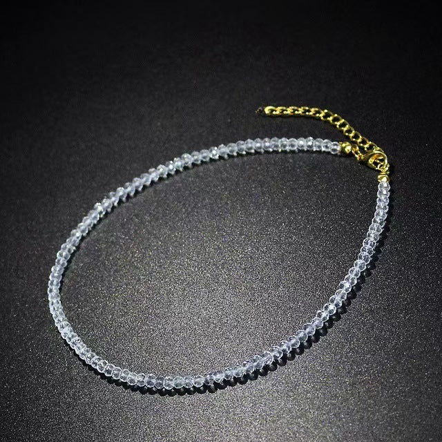 Orange faceted glass bead choker necklace showing the faceted bead texture