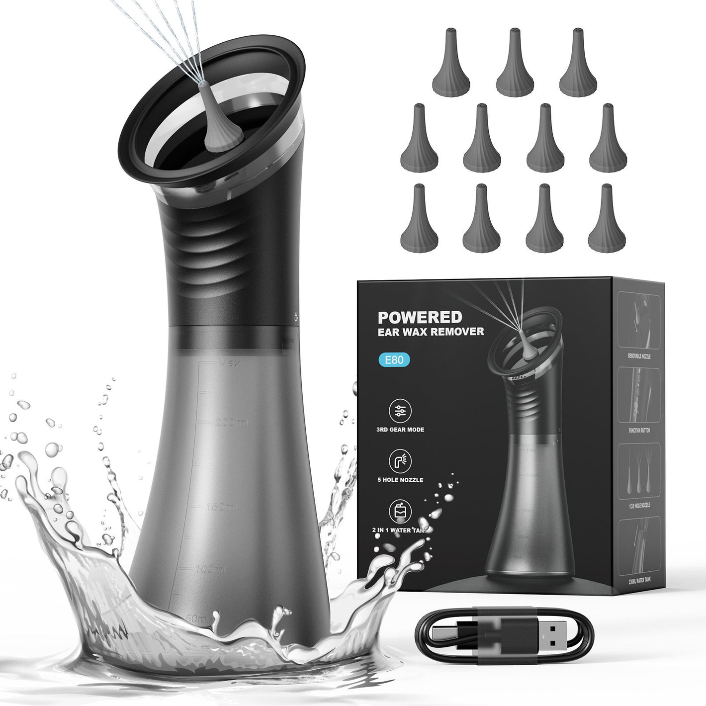 Black electric ear wash cleaner spraying warm water beside its box, eleven soft tips and USB cable