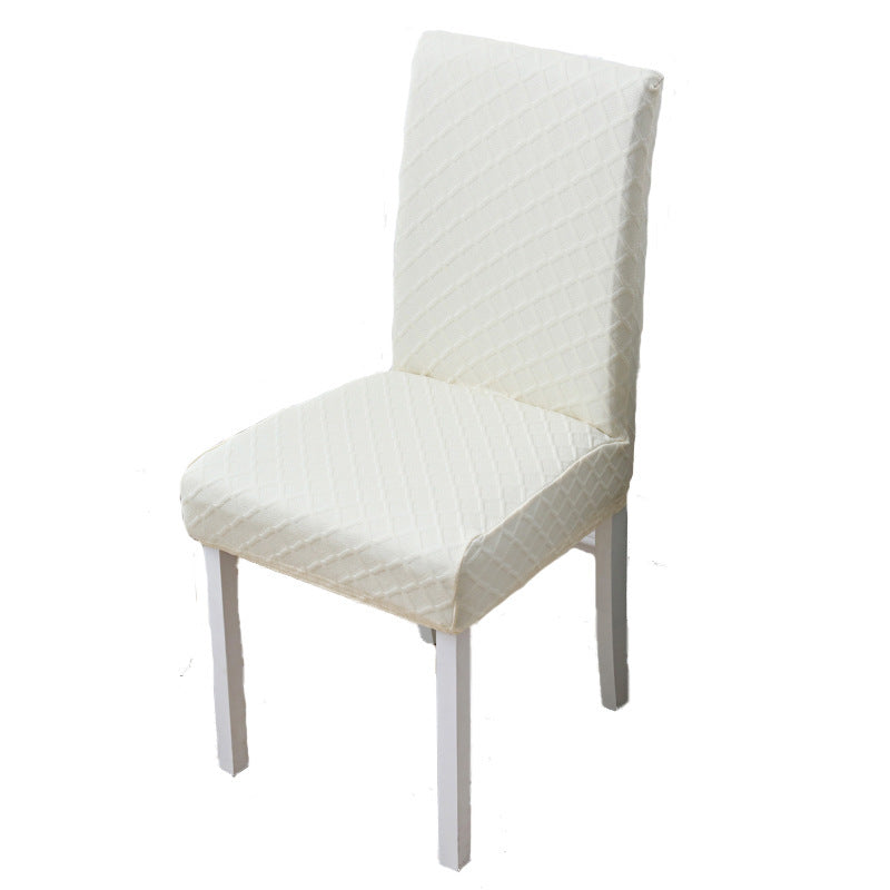 Diamond jacquard chair cover stretched over a dining chair seat and back