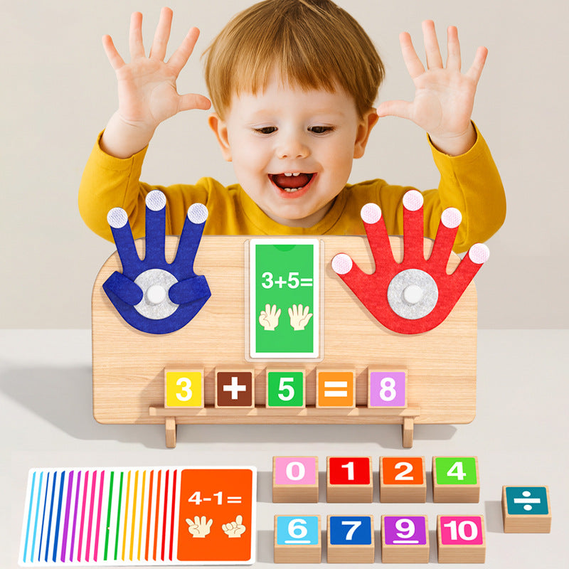 Smiling young child with raised hands behind a wooden finger math board with blue and red felt hands and a 3 plus 5 card