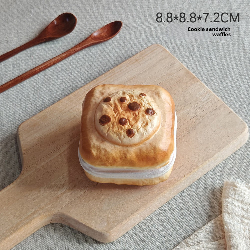 Bread squishy resting on a desk as a quiet fidget toy