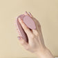 Close view of the soft silicone bristles on the leaf scalp brush