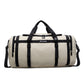 Close view of the zip pull and webbing strap hardware on the travel duffel bag