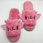 Single bat plush slipper photographed on a clean studio background