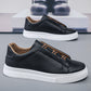 Black and white slip-on sneakers with black upper and white sole, size 43 option photo