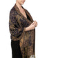Navy and gold paisley tassel shawl wrap worn draped over the shoulders with tasseled fringe ends