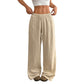 Side view of the loose wide leg cotton trousers showing the crinkle weave