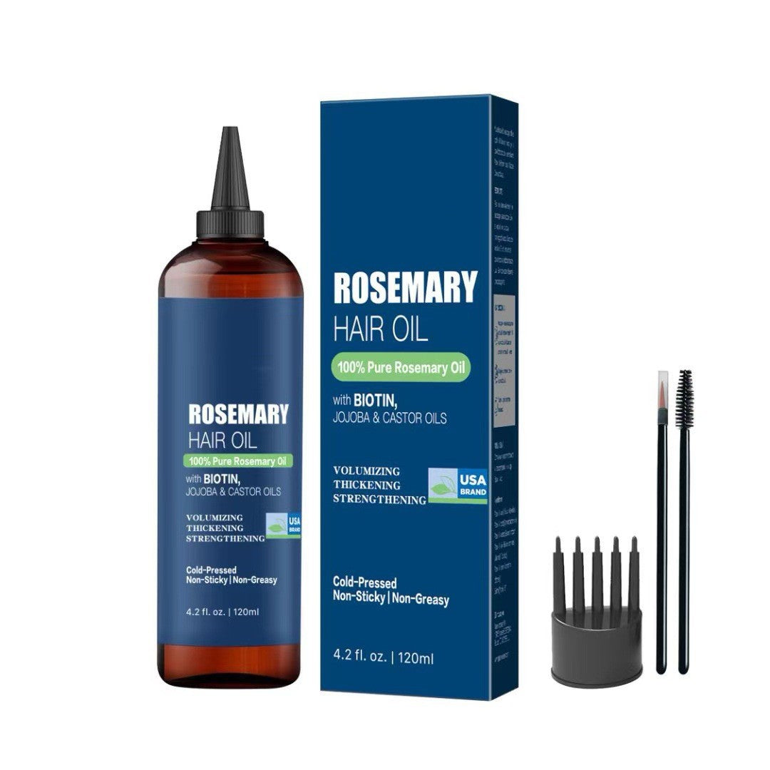 Dark blue rosemary hair and scalp oil bottle and box shown with a scalp comb and spoolie brushes