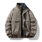 Dark khaki padded bomber jacket with fleece lined stand collar, snap placket and ribbed cuffs, front view, size XL