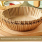 Air fryer parchment liner in use with food inside the basket