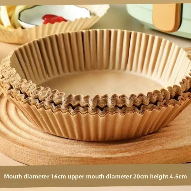 Air fryer parchment liner in use with food inside the basket