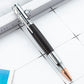 Bolt action ballpoint pen with rifle style bolt lever and wood barrel on a white background
