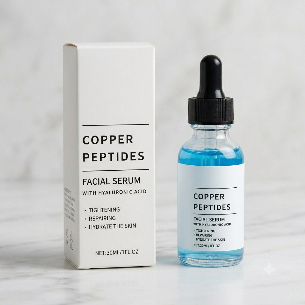 Copper Peptides facial serum bottle and white carton on a light marble surface