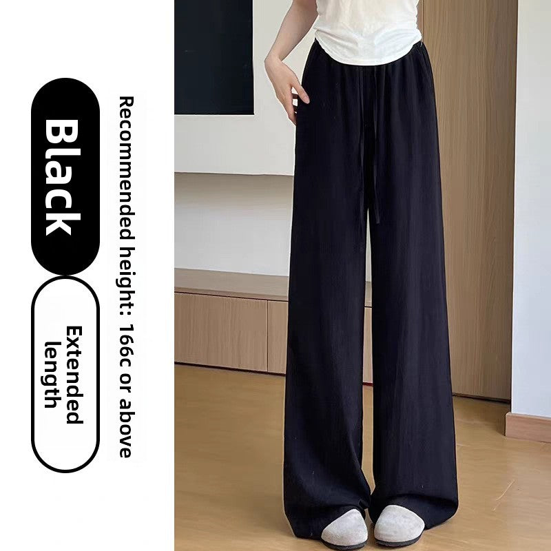 Womens high waist wide leg linen blend drawstring trousers, back view showing the elastic back waist panel