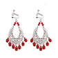 Bohemian vintage clip-on tassel drop earrings on a zinc alloy frame, handmade boho pair on white studio background