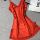Bright red satin slip nightdress with lace at the neckline and hem, flat on a gray cloth, option photo for size XXL