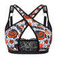 Flat front view of the white pumpkin print bra with crossed bands, a keyhole opening and a black lace panel
