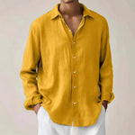 Mens long sleeve linen look button up shirt shown on a beach model