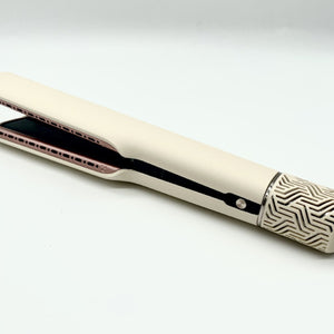 Close view of hair straightener rose gold vented plates and geometric etched cap