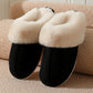 Black plush cuff slip-on mule slippers on a beige textured cushion, variant photo for size 44/45