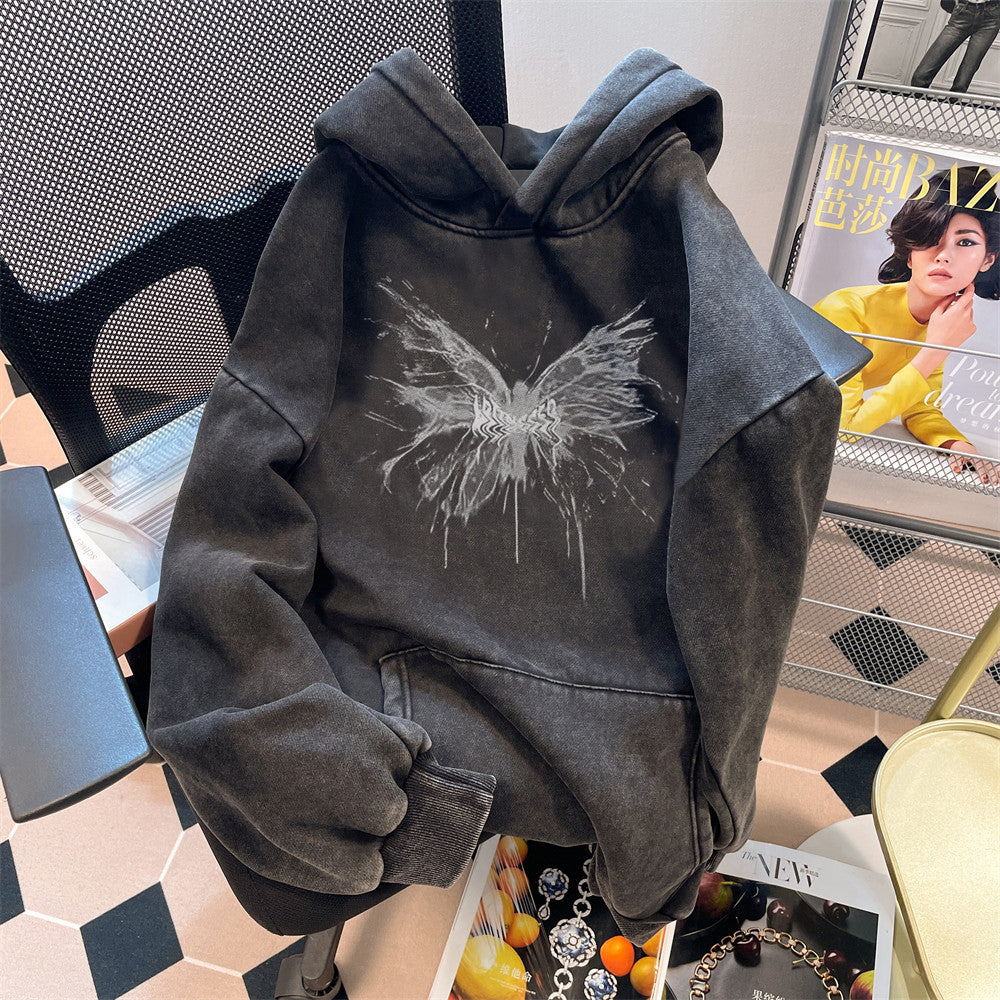 Washed black hoodie front view with the butterfly graphic