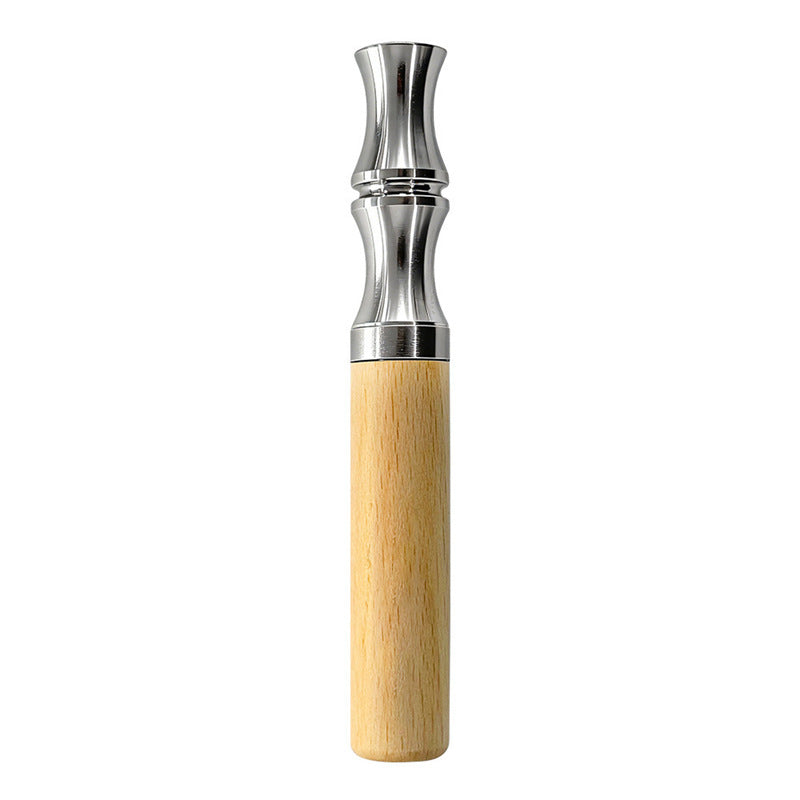 Light wood aroma stick alone on white, pale beech barrel under a waisted chrome toned mouthpiece