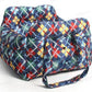 Padded car seat pet bed with raised bolster walls, carry handles and an inner clip top down view into the padded nest