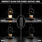 Black skull warmer lamp beside its packaging, presented as a gothic gift with a warm glow