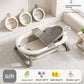 Baby bathtub with gray bath net across the basin and three washbasins hung on the wall