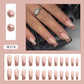 Full cover press-on almond nails in a blossom tip design, glossy finish shown on a hand