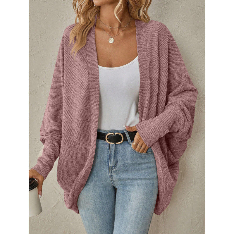 Blue open front drape cardigan with batwing sleeves shown on a female model