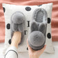 Gray plush bunny slippers with pom pom tails and a gray faux fur lining over a polka dot cushion, gray variant