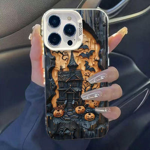 Halloween printed TPU iPhone case with a silver electroplated camera frame, held in a car