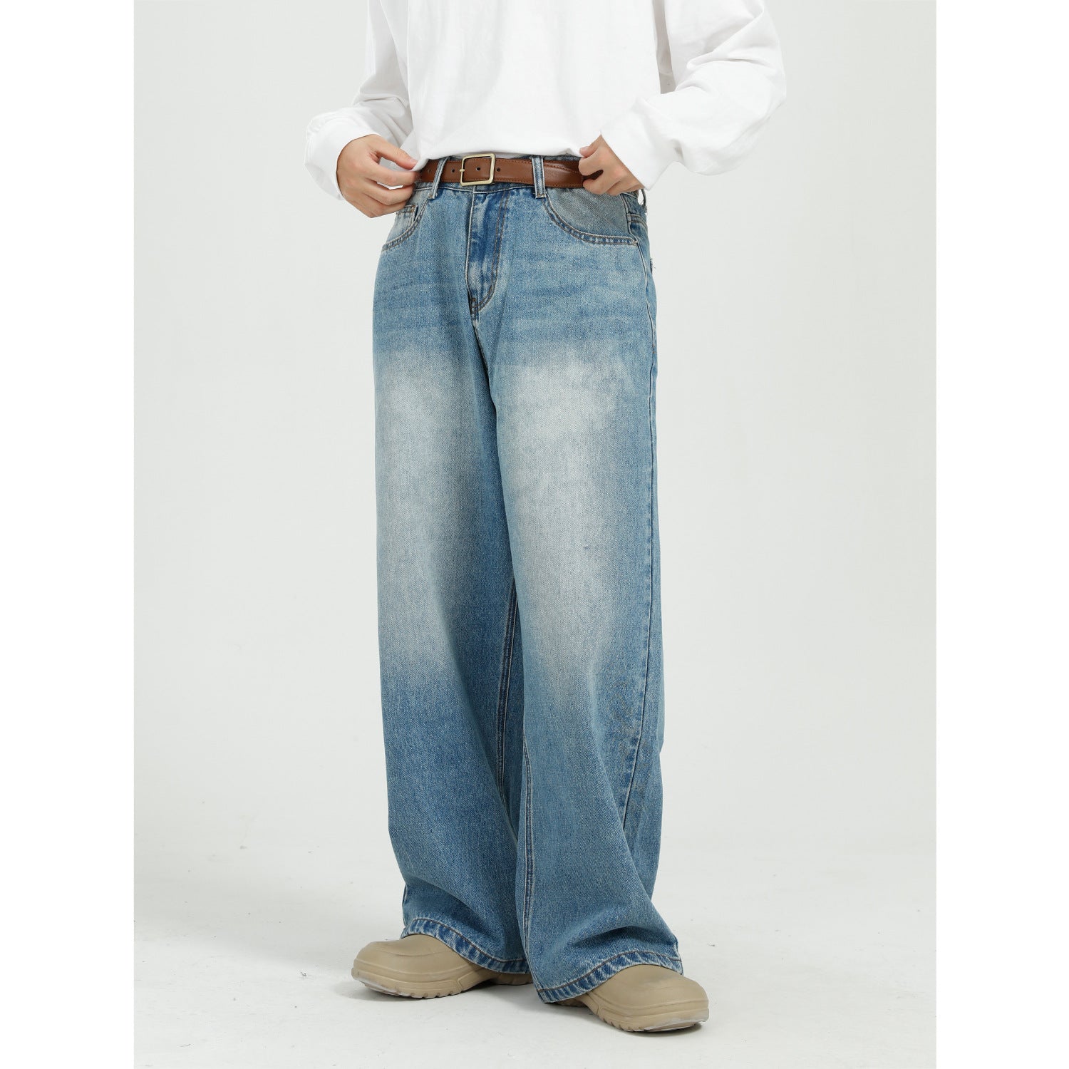 Men's blue straight leg jeans, full front view on a plain background