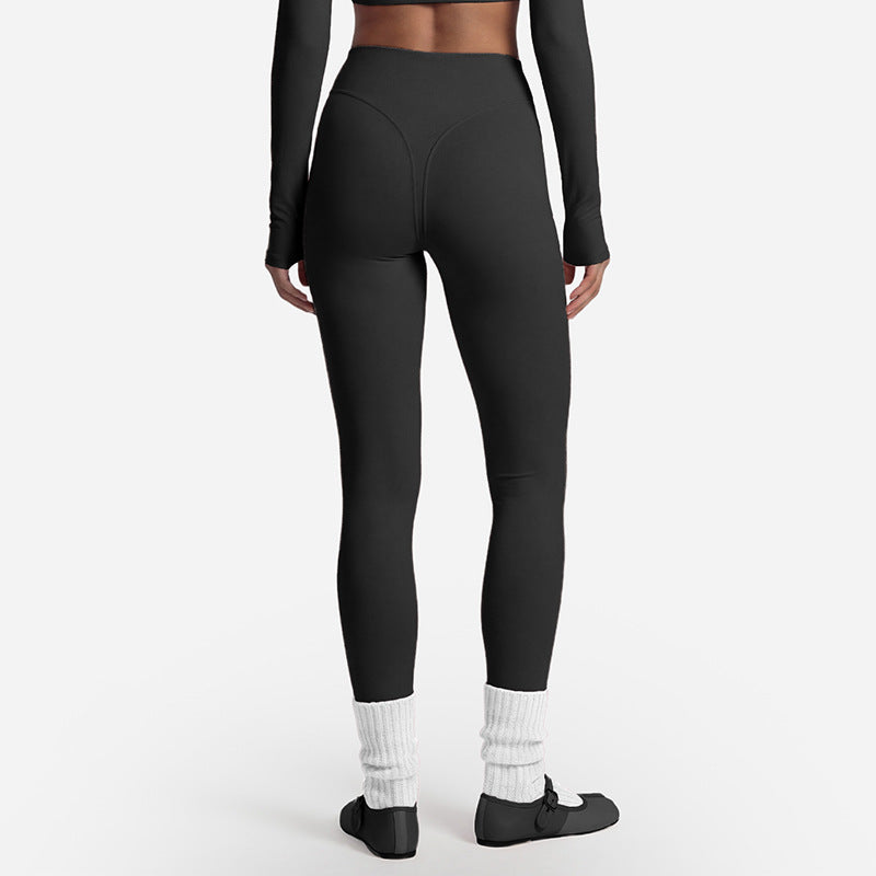 Long sleeve wrap top that crosses at the front and ties at the waist