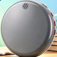 Gray round AI language practice device with red side buttons beside books, option photo for Gray