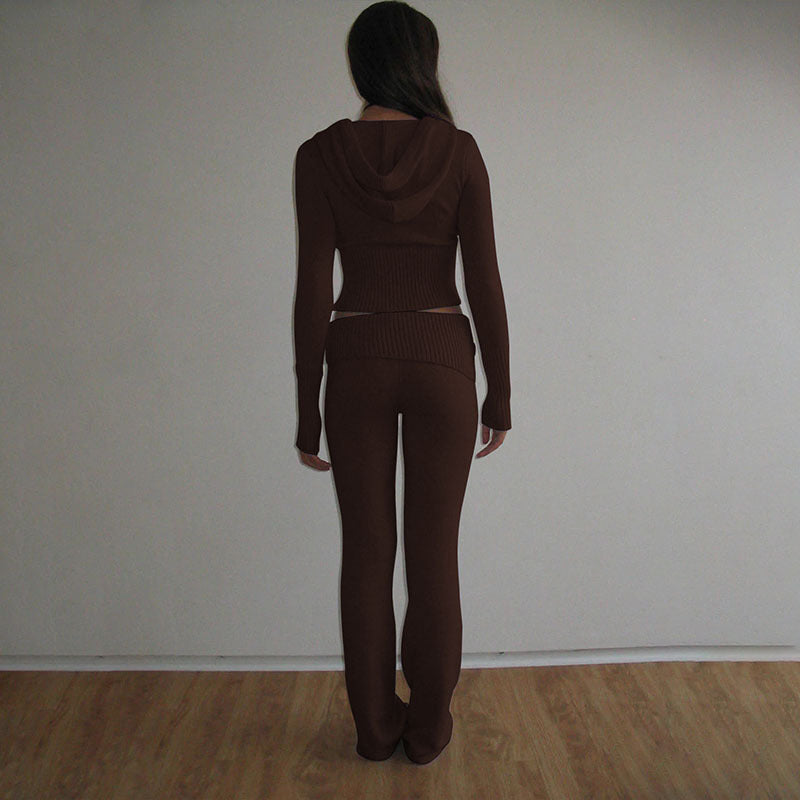 Back view of the hooded knit top and matching knit pants in a solid color