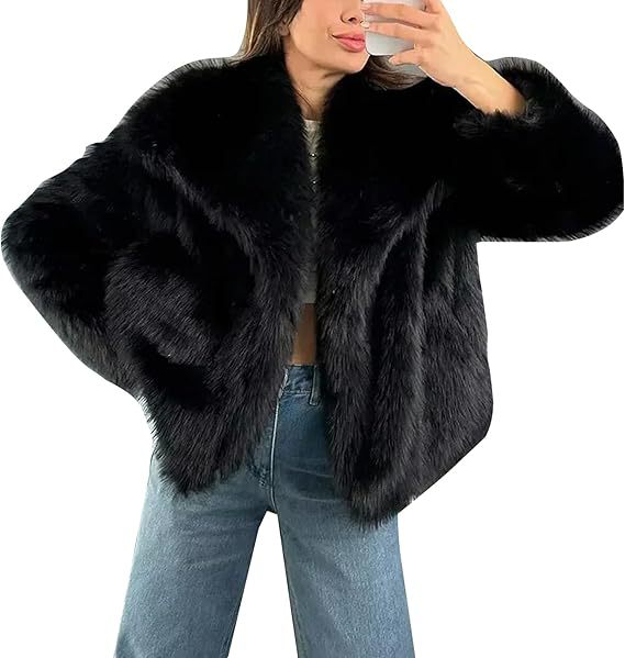 Faux fur winter jacket with an oversized lapel collar and panelled horizontal fur