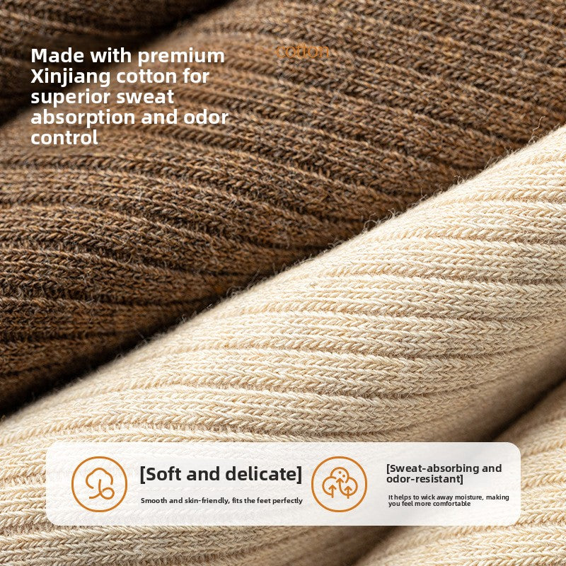 Close-up of ribbed knit fabric in brown and cream with a note on sweat absorption