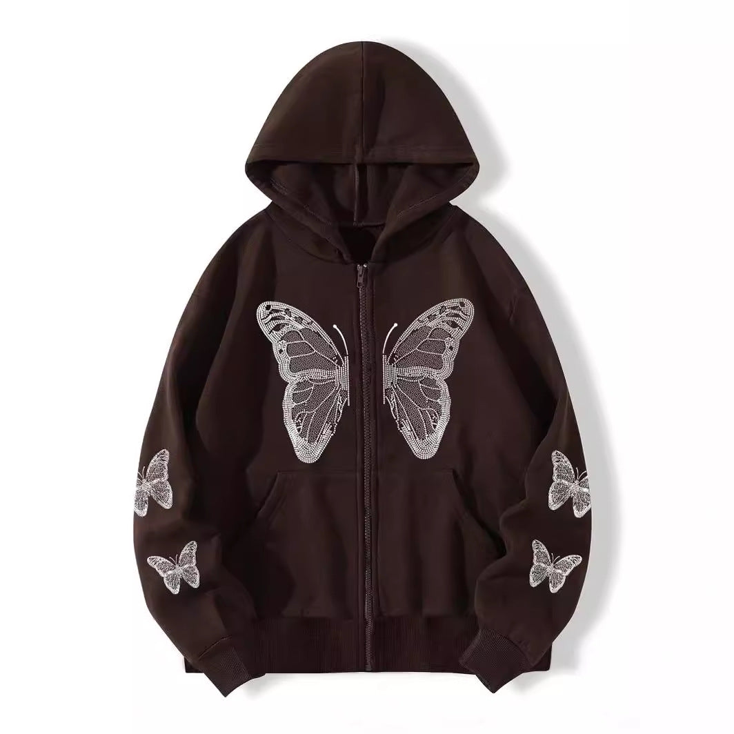 Angled view of the zip hoodie highlighting the rhinestone butterfly across the chest
