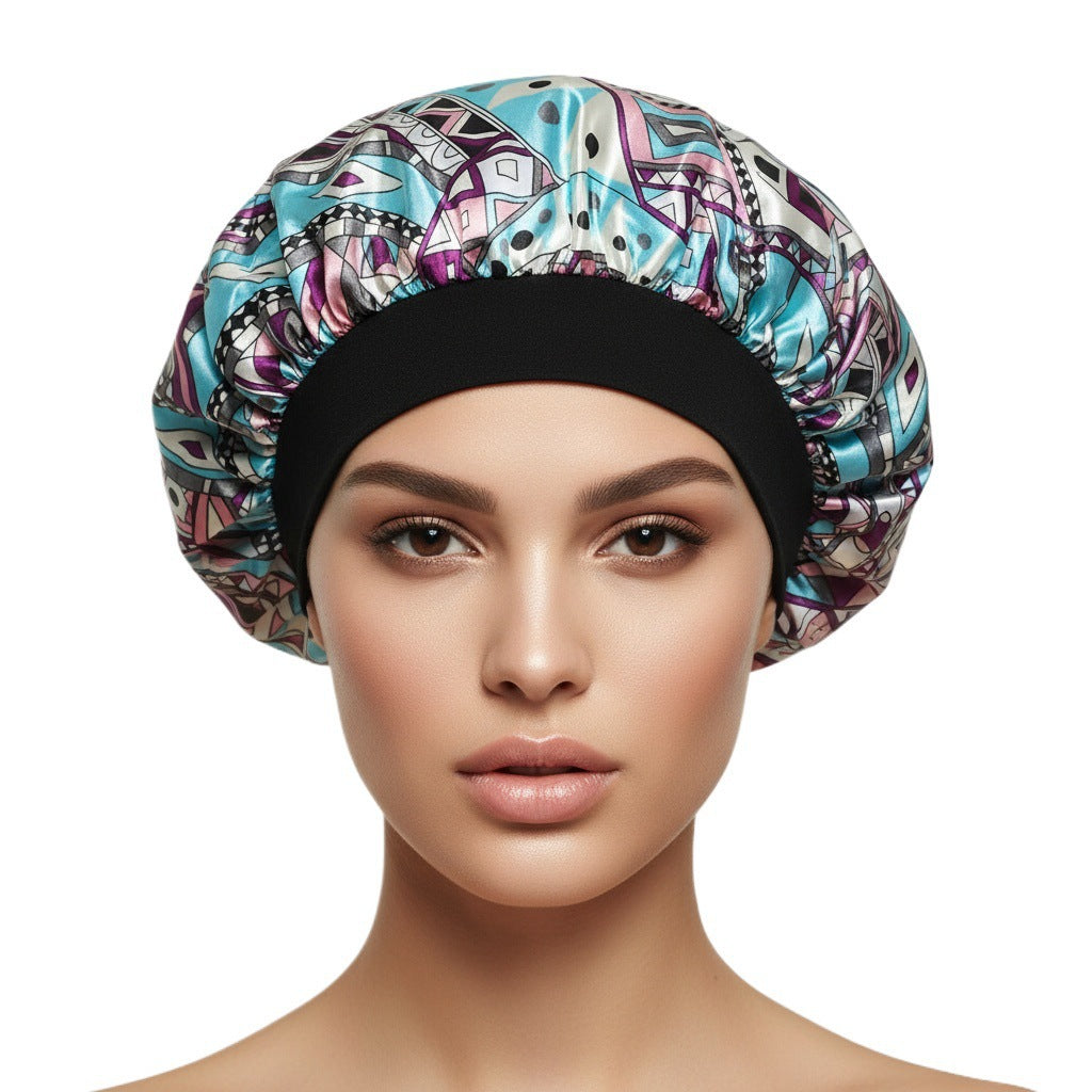 Turquoise Geometric Print satin sleep bonnet with ruffled crown and wide elastic band, 30 cm diameter