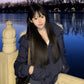 Navy Blue variant, size M: navy quilted hooded jacket worn by a model at a lake at dusk, hands in pockets