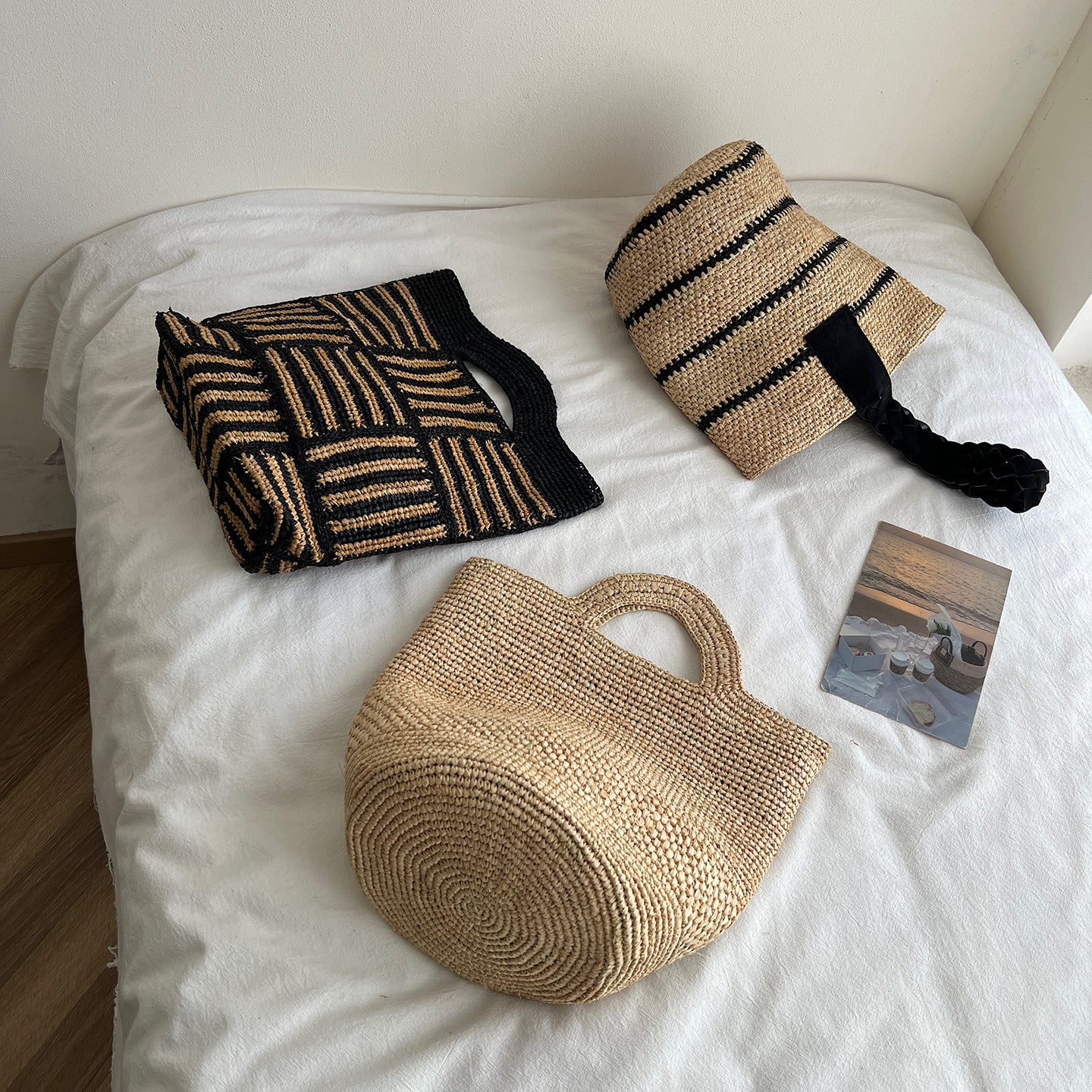 Raffia Hand-Woven Tote Bag | scale reference with hand